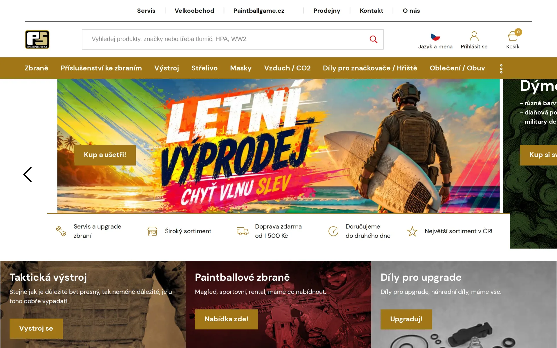Úvodní stránka e-shopu Paintball Shop s bannerem výprodeje a dlaždicemi kategorií na počítači.